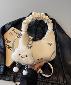 Túi xách cầm tay dễ thương kèm móc khoá gấu nổi bật
